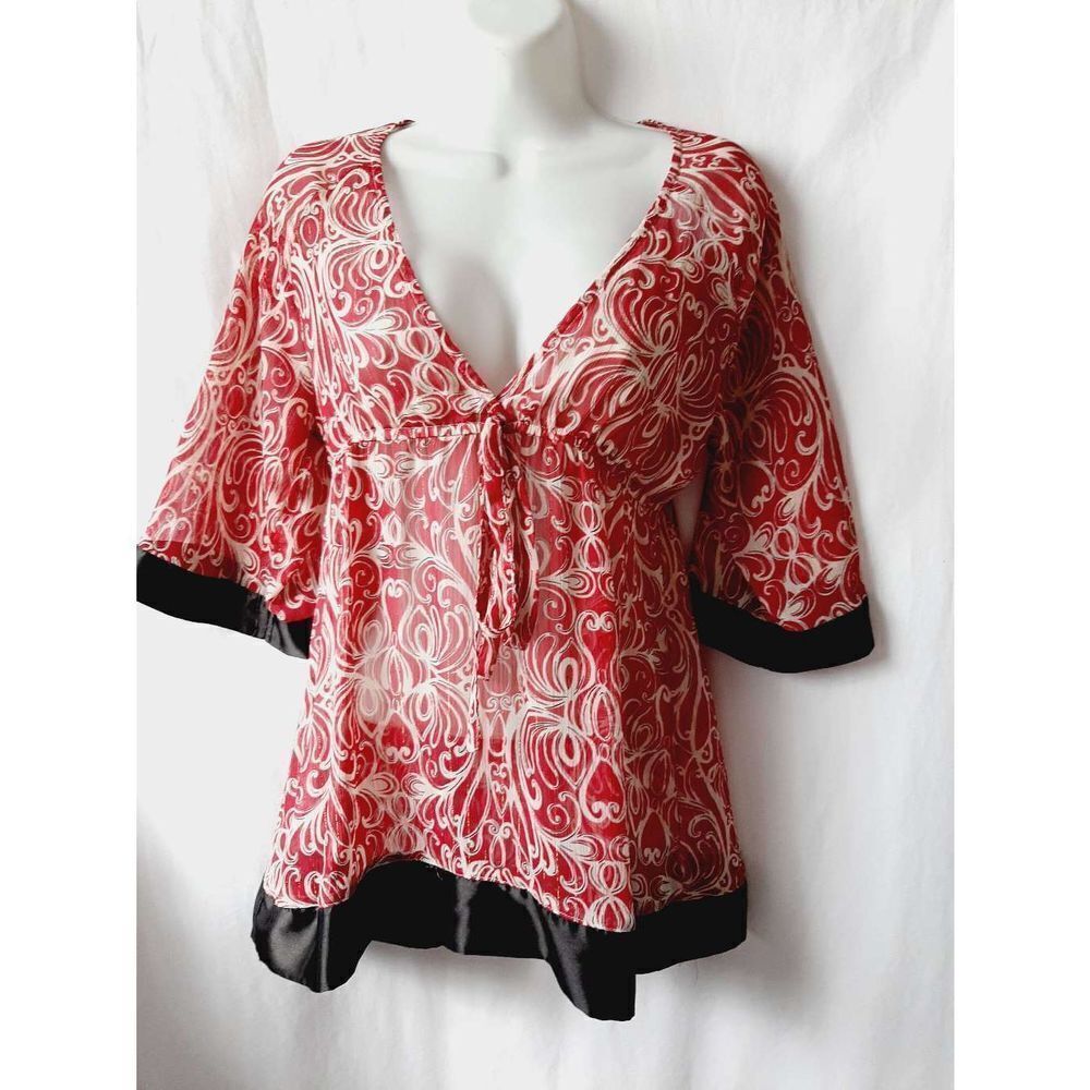 So wear it declare it red gold threaded sheer large v neck top